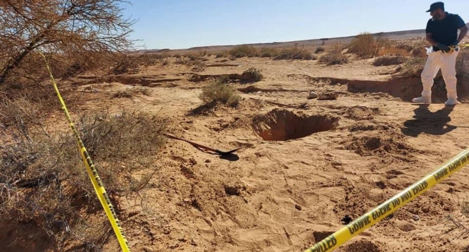 صورة أرشيفية لمقابر جماعية وجثث مجهولة في ليبيا